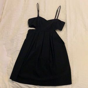 Boutique Black Dress with cutout sides and zipper back size medium